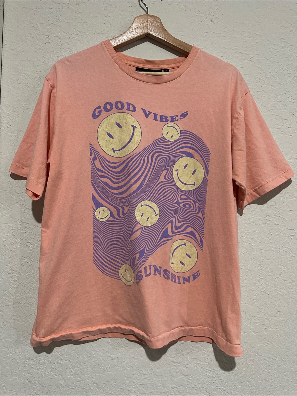 No Boundaries Peach Graphic Tee with Purple and Yellow Smile Design